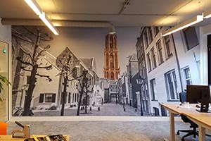 Akoestisch dempende fotowanden in textielframe